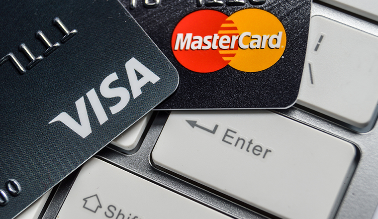 Mastercard, Visa to postpone some fee increases next month
